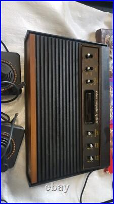 Atari 2600 CX-2600 Retro Console MADE IN HONH KONG WOODY VERSION WITH BOX GAMES Atari 2600 CX-2600 Retro Console MADE IN HONH KONG WOODY VERSION WITH BOX GAMES