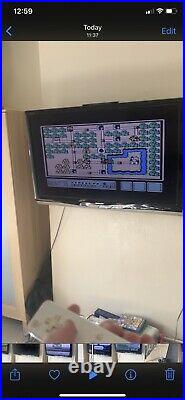 Nintendo Wii 2 Player Bundle, Mario Kart, Wii Fit Board. Retro games Installed