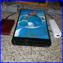 Nintendo wii u with 42 games and 63 retro games wii modded