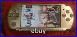 PSP 3000 silver with free 32GB Memory Card 50 psp Games! And 3000 retro games
