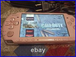 Sony PSP 3000 64 GB with 85 games + retro games with Charger and battery PINK
