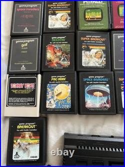 Vintage Atari 2600 Plus Video Game Console Black 21 Cartridge Retro MID Century Vintage Atari 2600 Plus Video Game Console Black 21 Cartridge Retro MID Century